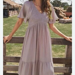 Light Blue Smocked Dress with sleeves.